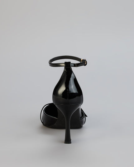 Point Taken Closed Toe Buckle Pumps
